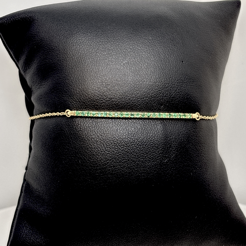 Namuri&nbsp;Bracciale in oro giallo con elemento centrale rigido e smeraldi  presso Castignoli - Orologeria e gioielleria a Monza