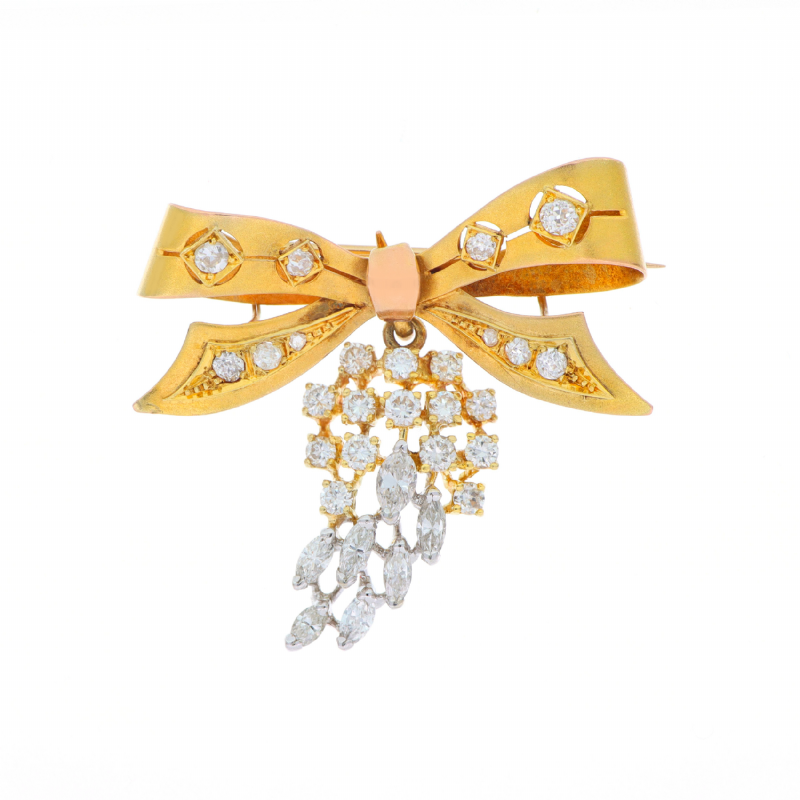  Spilla fiocco in oro con diamanti presso Castignoli - Orologeria e gioielleria a Monza
